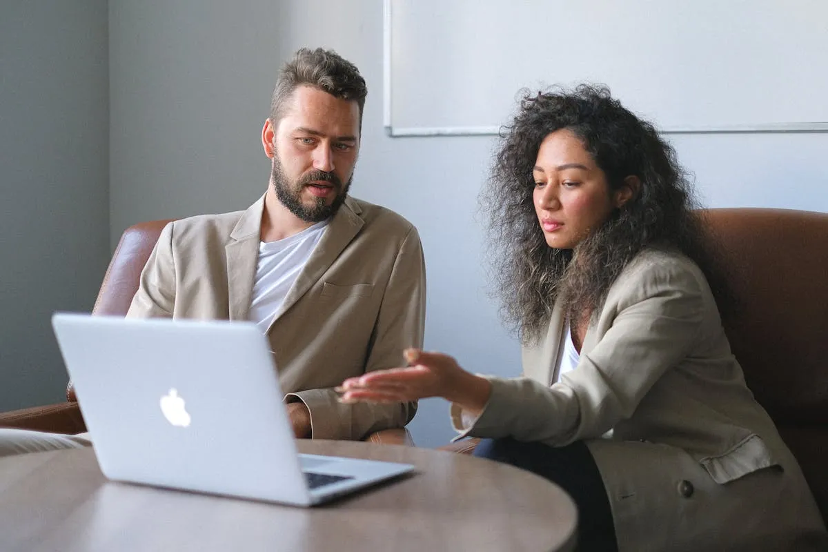 A coach walking a client through their wheel of life assessment scores, because the conversation after the chart is where the tool earns its keep