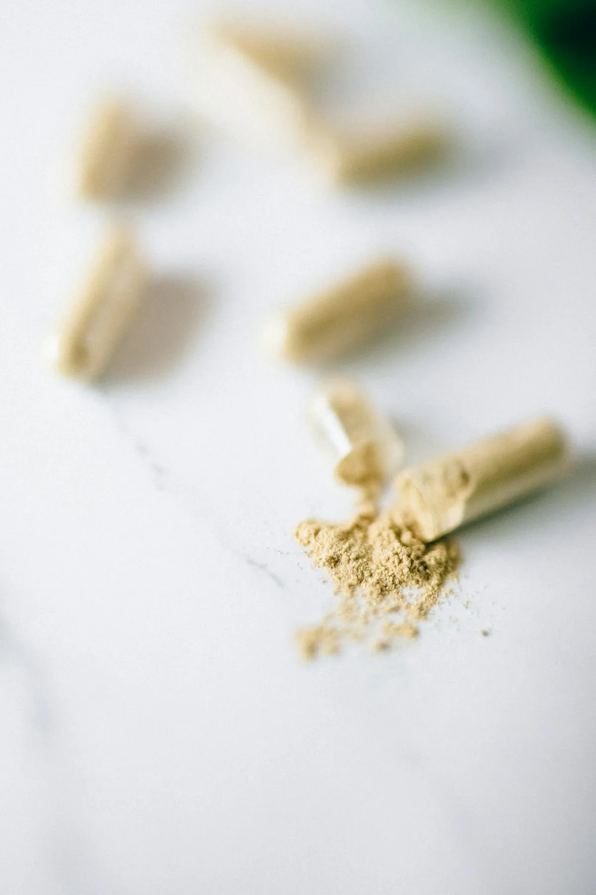 Ashwagandha root powder and capsule. KSM-66 is the most-studied standardized extract for cortisol reduction.